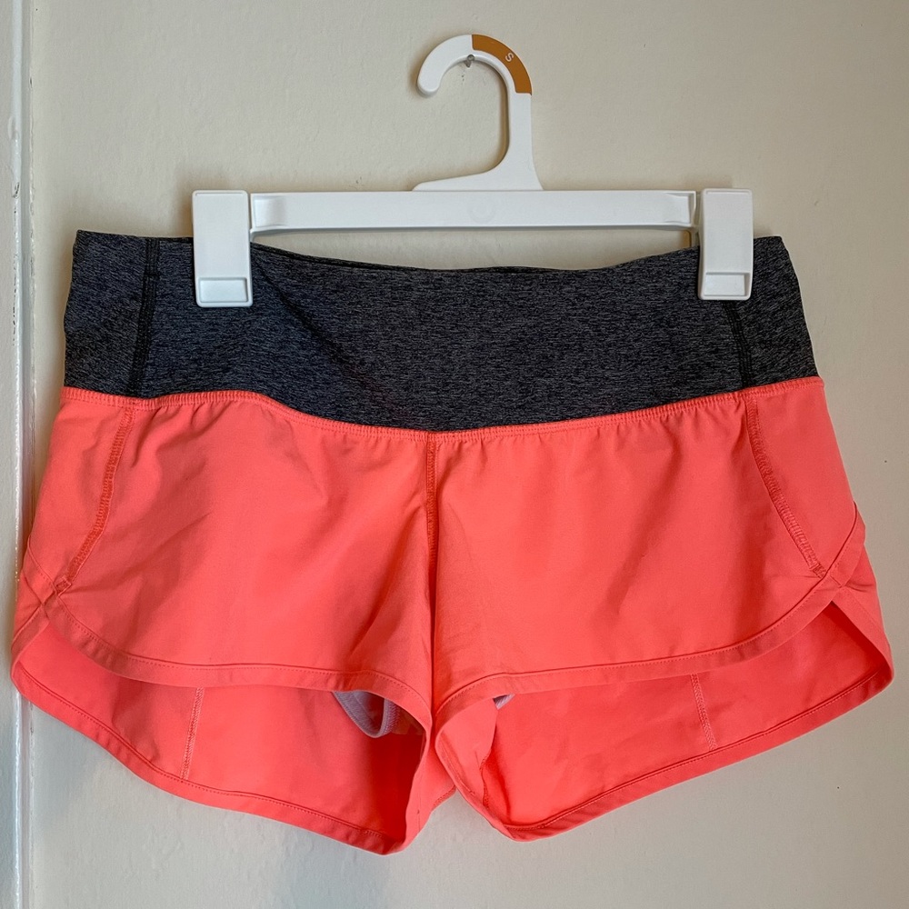 Women’s gently used coral Lululemon Running shorts